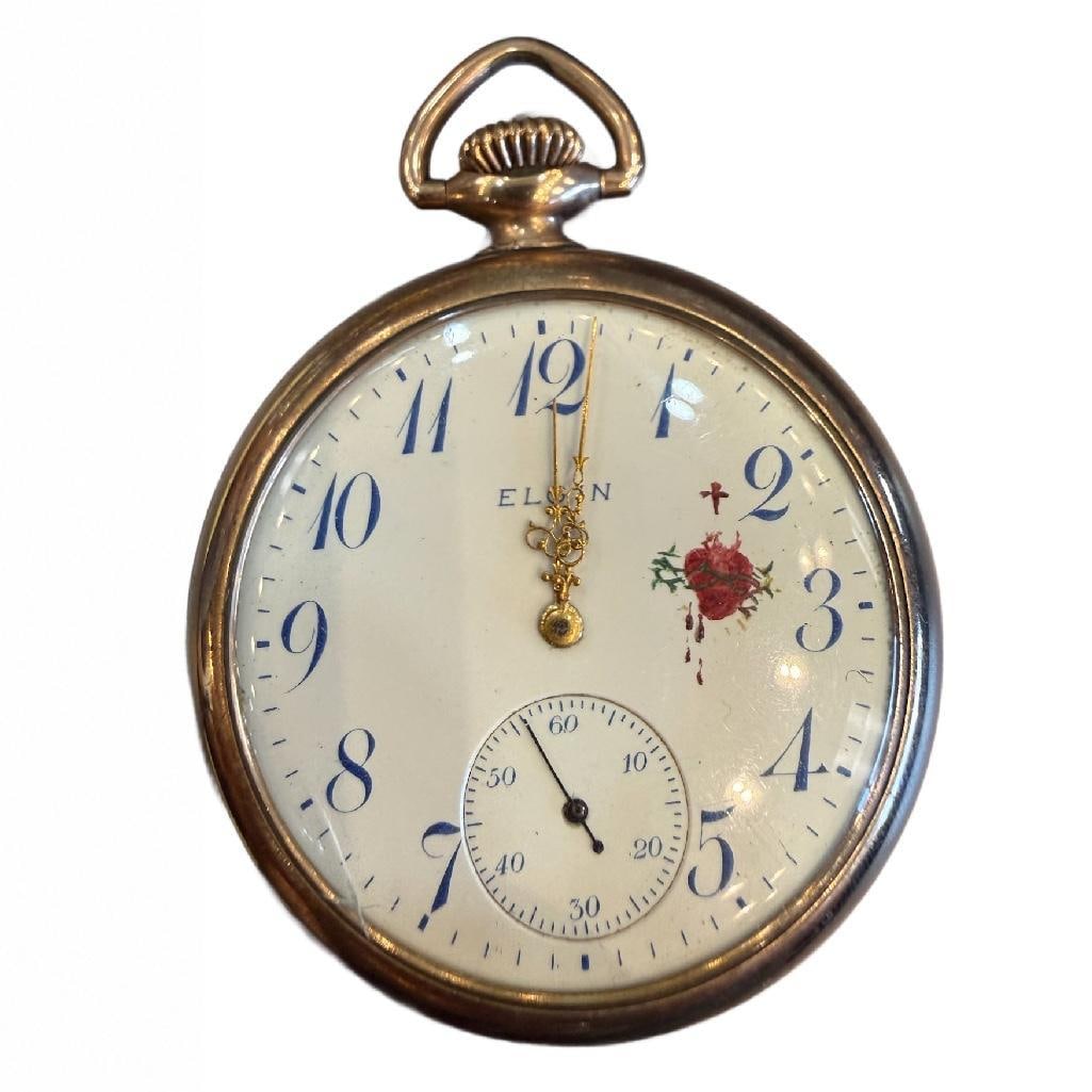 14k Rose Gold Antique Ladies Elgin "Sacred Heart Fancy Dial Open Face Pocket Watch: 14k Rose Gold Antique Ladies Elgin "Sacred Heart" Fancy Dial Open Face Pocket Watch. The Watch Measures Approximately 2 inches in Diameter.