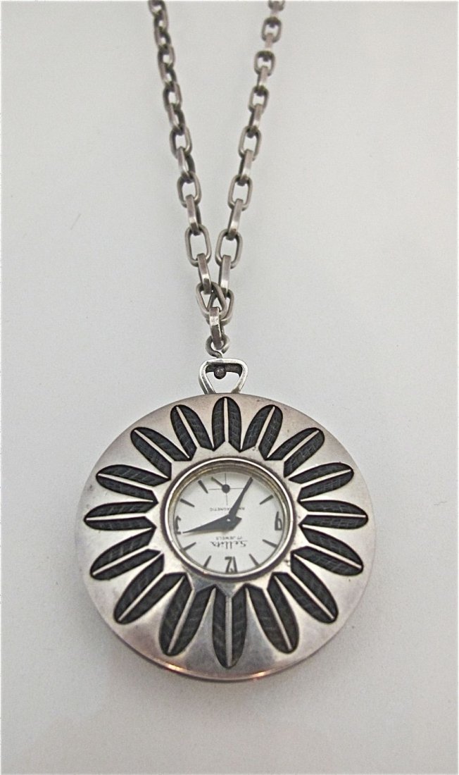 Sterling Silver Native American (Hopi) From the 3rd Mes: Sterling Silver Native American (Hopi) From the 3rd Mesa Double Pendant with a Watch, "Sellita 17 Jewels Antimagnetic 10K R.G.P." Inside is the Hopi Craft Symbol on a 36" Sterling Silver Handmade Link