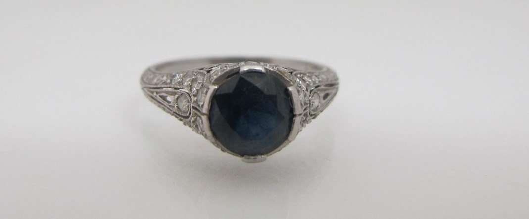 Art Deco Platinum Sapphire and Diamond Engagement Ring: Art Deco Platinum Sapphire and Diamond Engagement Ring Containing 1 Brilliant Cut Sapphire=approx 2.50cts., 28 Single Cut Diamonds=approx .84cts.
