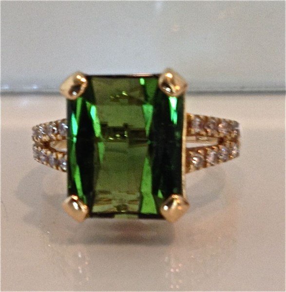 18K Yellow Gold Green Tourmaline and Diamond Ring,: 18K Yellow Gold Green Tourmaline and Diamond Ring, Emerald Cut Green Tourmaline=7.86cts., and 16 Brilliant Cut Diamonds=.21cts.