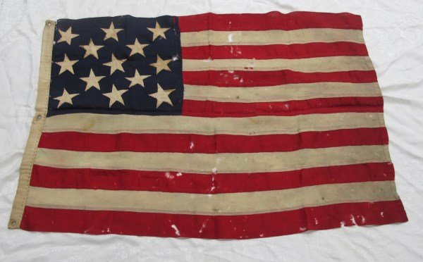 Antique 13 Star American Flag, 3-2-3-2-3 Pattern: Antique 13 Star American Flag, 3-2-3-2-3 Pattern, or Francis Hopkinson Pattern. 46 1/2 x 32 in., Worsted Wool with 13 hand-sewn, double-sided cotton stars, the fly is constructed of 13 hand sewn strip