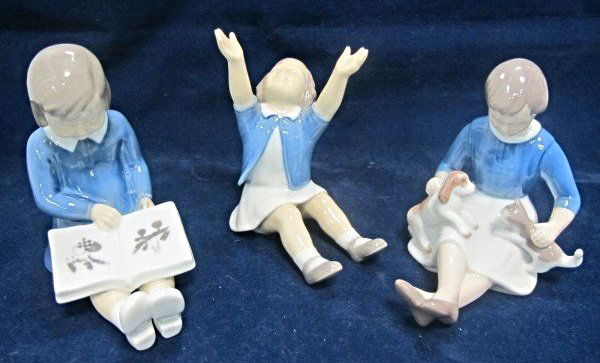 Collection of Bing & Grondahl figurines #2324 Hands Up: Collection of Bing & Grondahl figurines #2324 Hands Up to Mom .. Measures 4-1/2 tall, #2247 First Book . Height: 4 1/2',#2333 Make Friends by Vita Thymann signed figure Girl with Cat and Dog , 4-1/4"