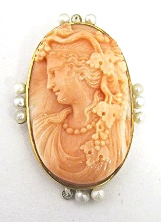 Antique Natural Coral & Seed Pearl Carved Cameo Brooch: Antique Natural Coral & Seed Pearl Carved Cameo Brooch. The brooch is in excellent condition, no repairs... and it measures 1 3/4" x 1 1/4" from the seed pearls, now on the top of her head are leaves,