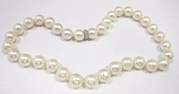 18K White Gold Pearl Necklace with Diamond Clasp: 18K White Gold Pearl Necklace with Diamond Clasp, 11Dia=.62cts., 12x13.5mm