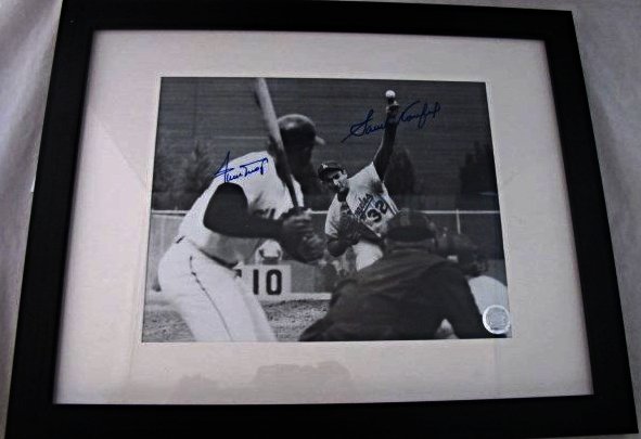 Sandy Koufax and Willie Mays Signed Photograph: Sandy Koufax and Willie Mays Signed Photograph Certified by GFA certificate number GFAA-51096 measures 8 x 10 inches and 12 1/2x15 1/2