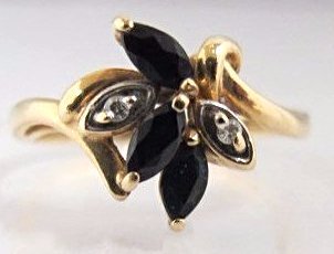 14K Yellow Gold & White Gold Sapphire and Diamond Ring: 14K Yellow Gold & White Gold Sapphire and Diamond Ring Containing 3 Marquise Cut Sapphires and 2 Single Cut Diamonds, 1.67dwt. Size 6 1/2