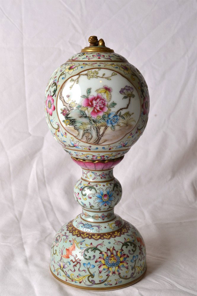 3 PIECE FAMILLE ROSE INCENSE BURNER: Round top with enameled birds on branches and flowers, pierced with ruyi lid in gilt, bottom piece with lotus flower, decorated with bats, flowers, vines and symbols. Four character blue mark. 11.5" H
