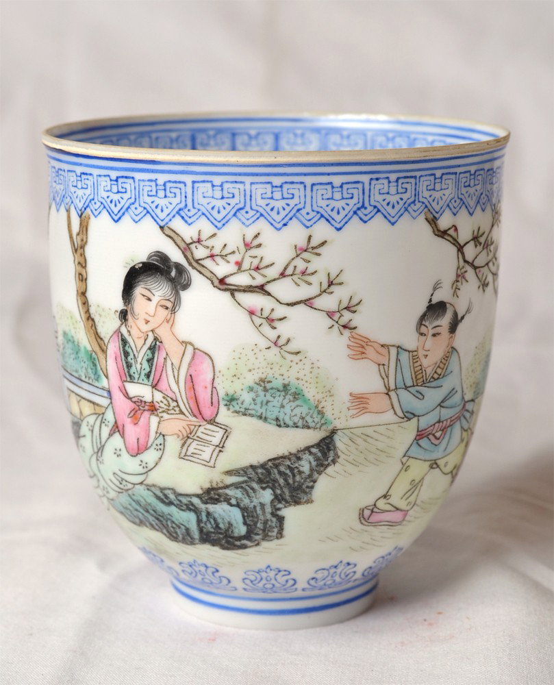 EGGSHELL PORCELAIN CUP: Interior with duck in red, exterior enameled with colorful butterflies. Six character mark in red. 3" H x 3.125" DIA.