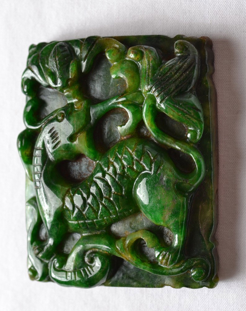 CARVED JADE PLAQUE: One side carved with chilong, the other side carved with ruyi and bats. 2.25" h x 1.875" W.