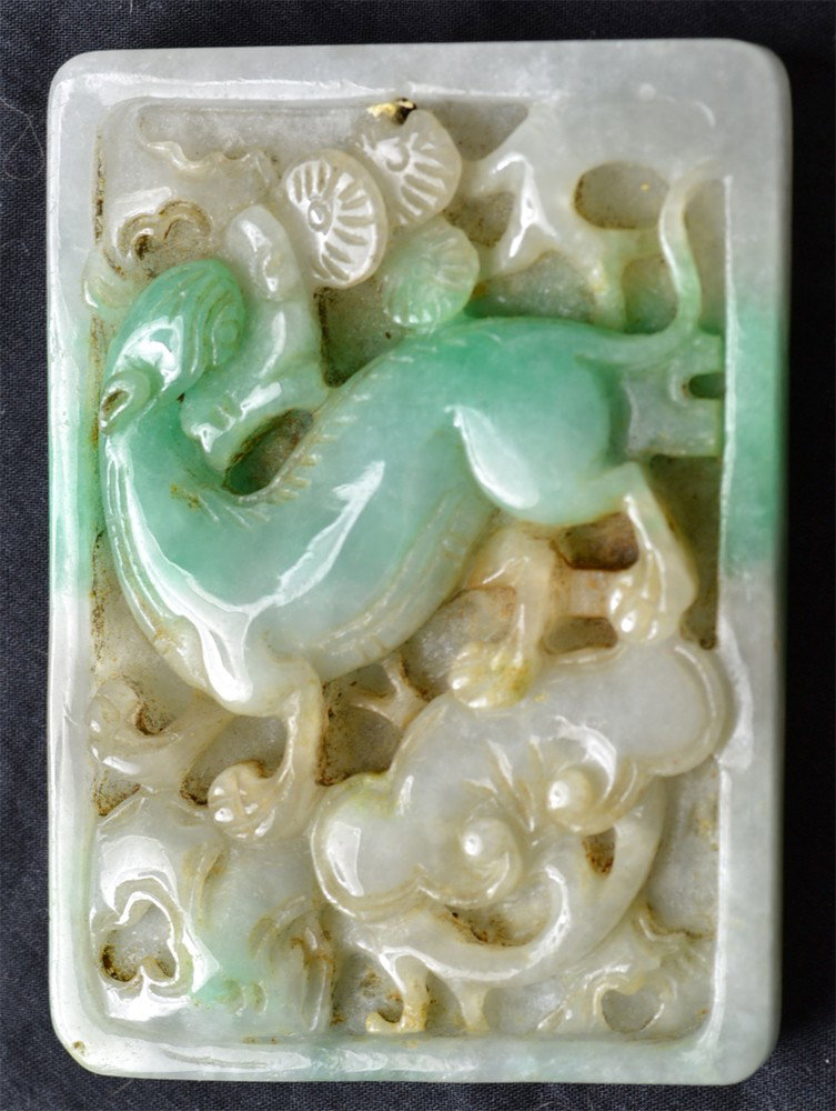 CARVED JADEITE PLAQUE: One side carved with chilong and ruyi and the other side carved with qilin and ruyi. 2.375" H x 1.75" W.