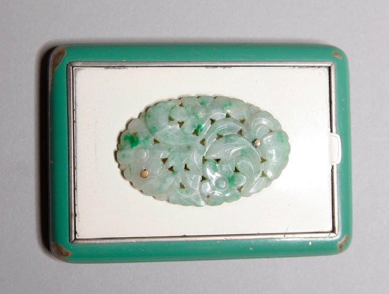 CHINESE EXPORT COMPACT WITH JADEITE: Ladies compact with powder reservoir and mirror, with carved openwork jadeite plaque decoration on top. 3" L.