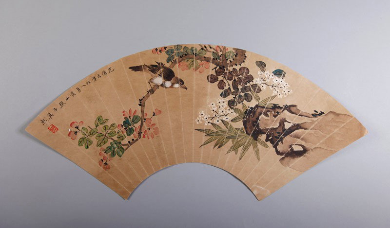 CHINESE FAN FACE BY SHEN QUAN: Painted with single bird in a pink and white blossom tree. Caligraphy signature and seal mark. 7.5" H x 20.375" W.