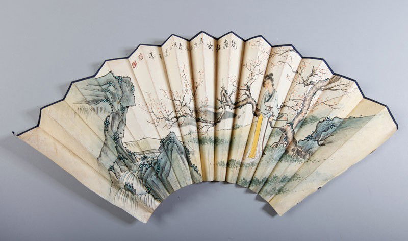 CHINESE FAN FACE BY WANG SU: Folded fan painted with female figure with fan in a landscape, signature and 2 red seal marks to one side, the other side painted with caligraphy. 8" H.
