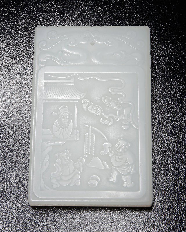 CHINESE CARVED JADE ZI GANG PLAQUE: One side carved with figures and large pot, the other side carved with caligraphy. 2.375" L.
