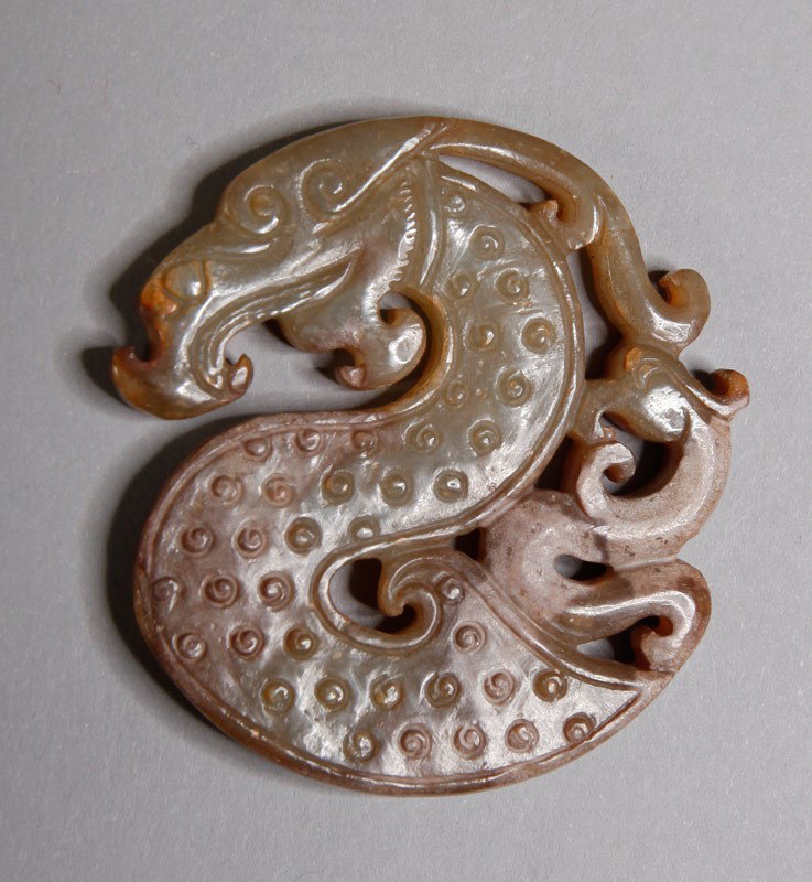 CHINESE HAN DYNASTY STYLE JADE PENDANT: Both sides carved in "S" form dragon. 2.125" H.