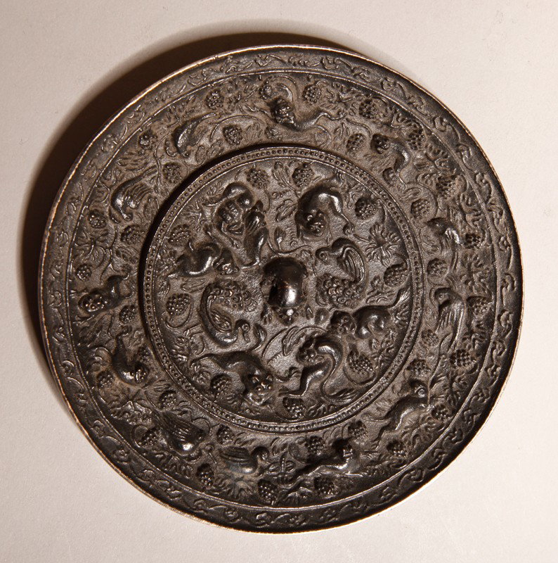 CHINESE BRONZE HAND MIRROR: Molded with birds, seals and flowers. 4.25" DIA.