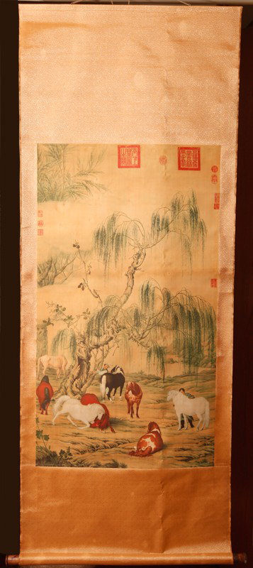 CHINESE SCROLL PAINTING BY LANG SHINING: LANG SHINING (GIUSEPPE CASTIGLIONE). Attached to silk brocade depicting various wild horses with figures. Seal marks throughout with two large at top. 40.5" H x 22.75" W (painting only).