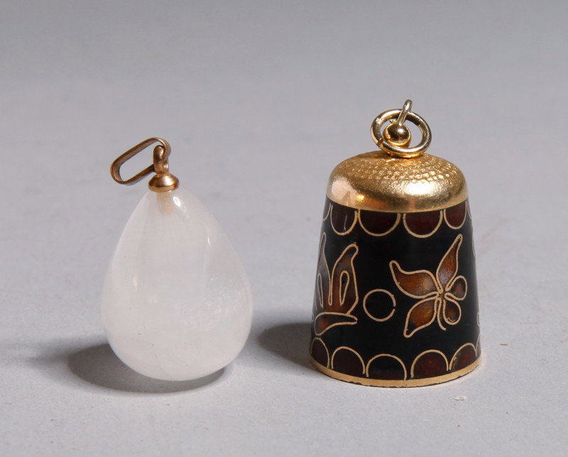 2 CHINESE PENDANTS: Includes an egg form quartz pendant, and a enameled thimble form pendant. Largest .875' L.