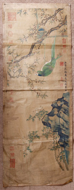 CHINESE PAINTING SIGNED SHEN QUAN: Depicting a colorful parrot hanging from a chain on a tree. Signature and numerous seal marks throughout. Unframed, 52" H x 19.5" W.