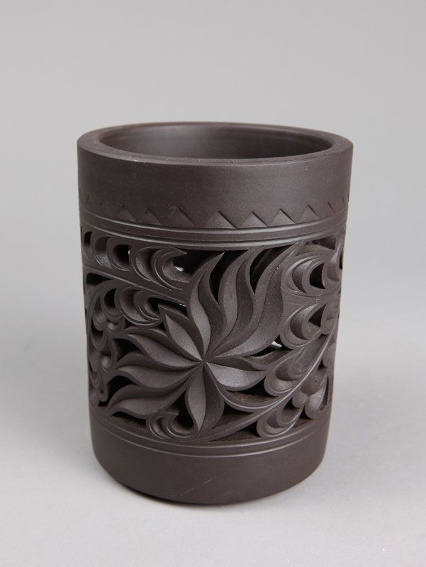 CHINESE ZI SHA POTTERY BRUSH POT: Openwork carved with two large lotus flowers and scrolling leaf designs. Four character impressed circular mark on underside. 4.625" H x 3.75" DIA. Excellent condition.