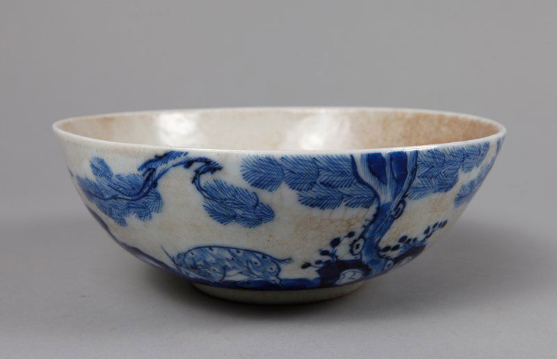 CHINESE LATE MING BLUE & WHITE PORCELAIN BOWL: The interior with two circles and image of deer, tree and poem in caligraphy. Exterior decorated with deer, trees and poem in caligraphy. 2.5" H x 6.875" DIA. Crazing and staining throughout, mainly t