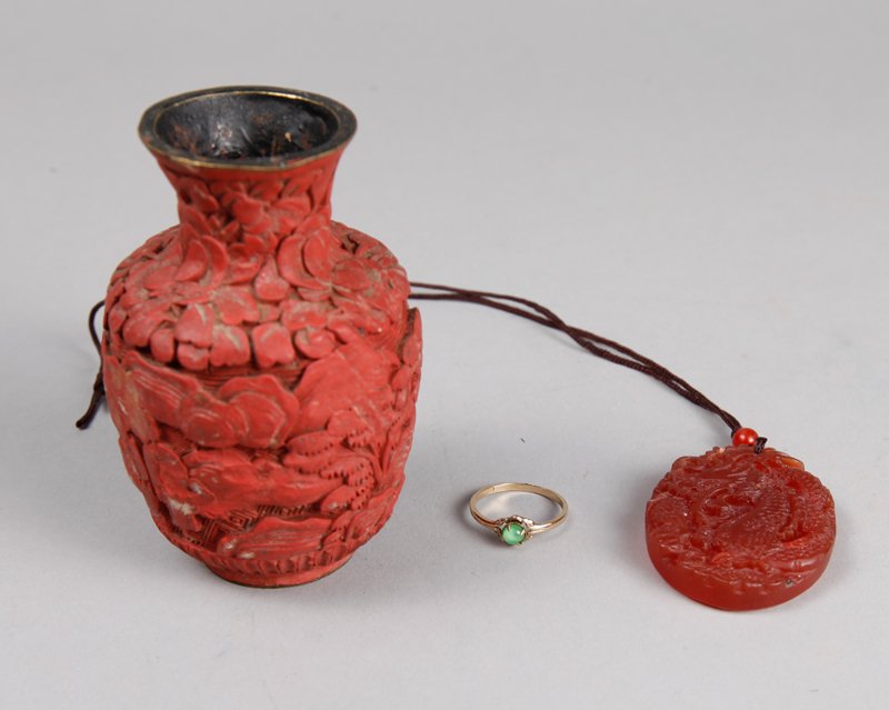 3 CHINESE COLLECTIBLES: Includes a small cinnabar vase, a hardstone pendant and a ring with green hardstone. Tallest 3.125" H. Vase with flattened areas.