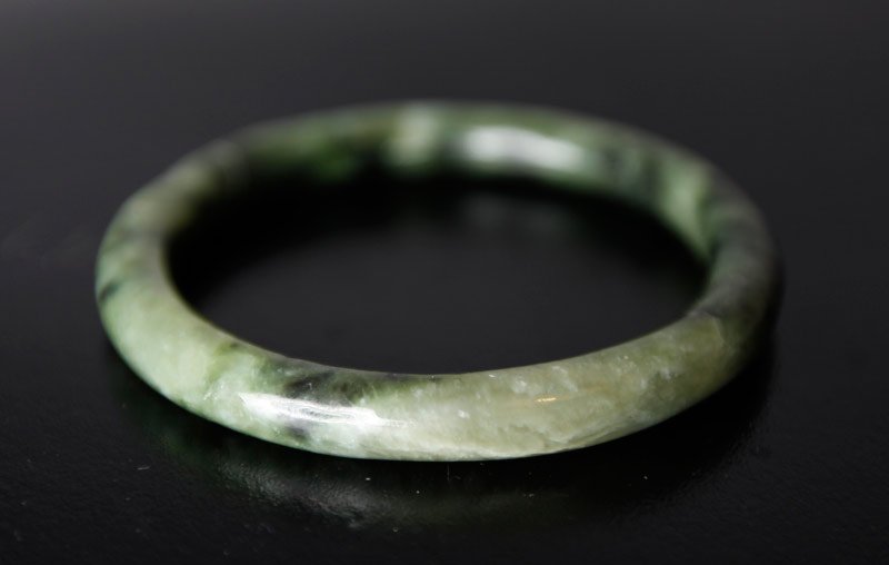 CHINESE JADE BANGLE: Dark to light green. 3.125" outside diameter, 2.5" inside diameter. Excellent condition.
