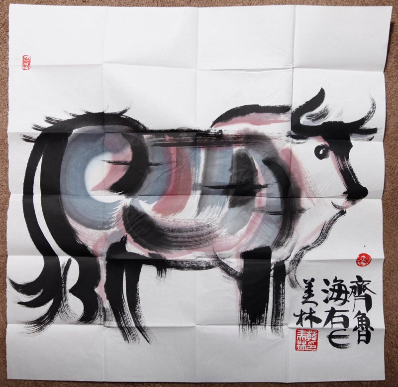 CHINESE INK PAINTING BY HAN MEILIN W/ CERTIFICATE: Painted water buffalo with signature, 2 seal marks, certified certificate, booklet and stamp. 27.125" H x 27" W.