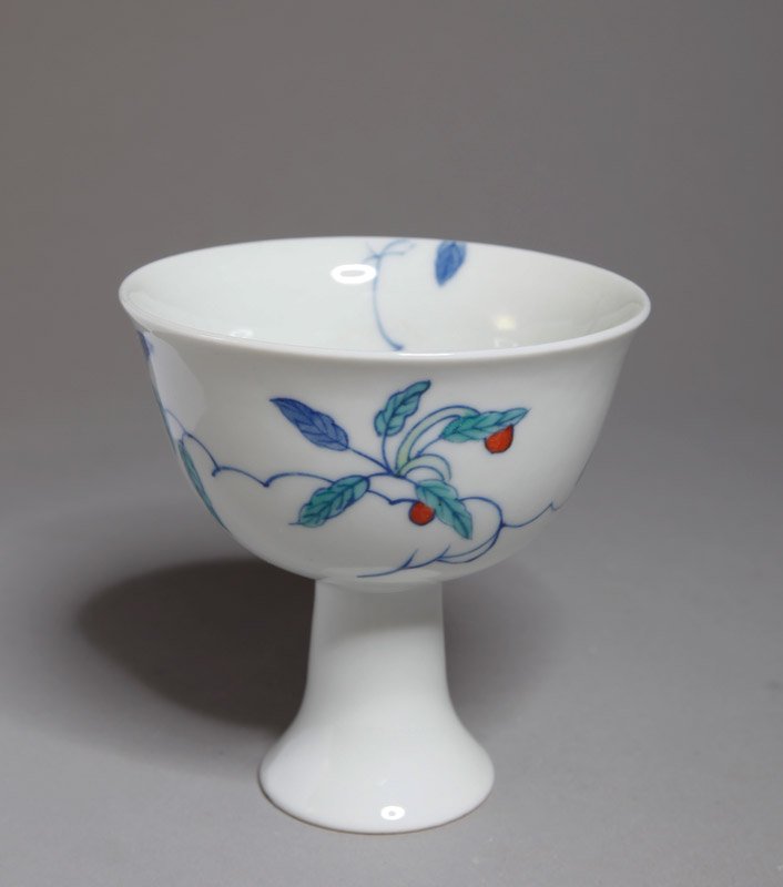 CHINESE DOU CAI PORCELAIN COMPOTE: Small compote with interior and exterior decorated with leaves and butterflies. Six character mark in blue. 3.375" H x 3.375" DIA.