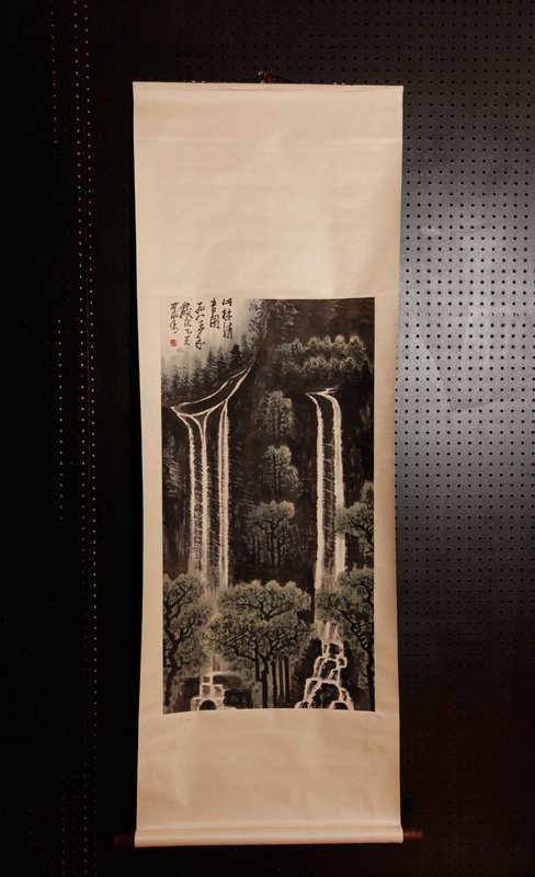 CHINESE SCROLL PAINTING ATTB. TO LI KE RAN: Finely painted to depict a mountain waterfall. Caligraphy and seal mark in upper left. Attached to silk brocade. 38" H x 19.5" W, painting only. Excellent condition.
