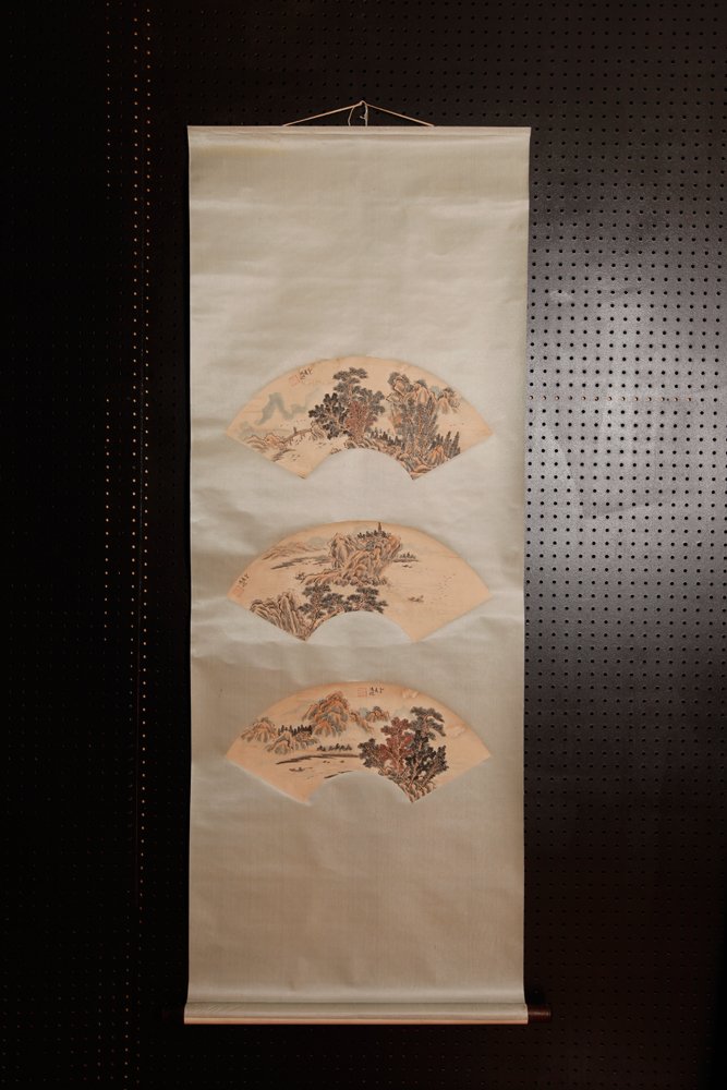 CHINESE SCROLL PAINTING ATTB. TO FENG CHAO RAN: Three piece paintings, each a fan and each depicting landscapes with figures. All three with signature and seal marks. Attached to silk brocade. 6.75" H x 20" W, fans only. Excellent condition.