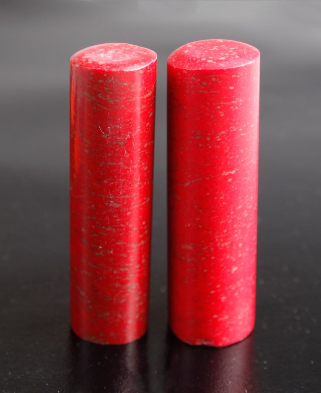 2 CHINESE CHICKEN BLOOD SOAPSTONE SEALS: Both cylindrical, one slightly wider. Largest 2.75" L.
