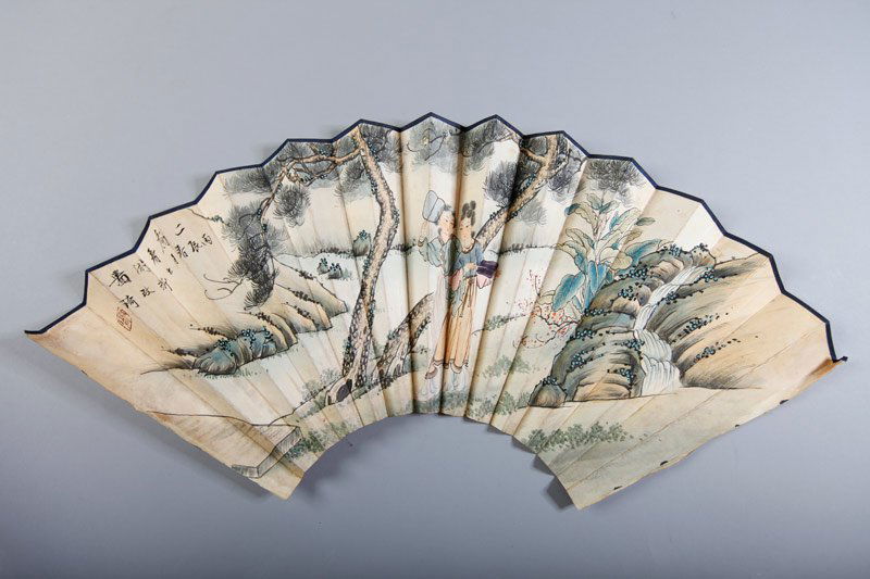 CHINESE FAN FACE ATTB. GAI QI: Folded fan painted with 2 female figures in a landscape with signature and seal mark to one side, the other side painted with caligraphy and seal mark. 7.75" H.