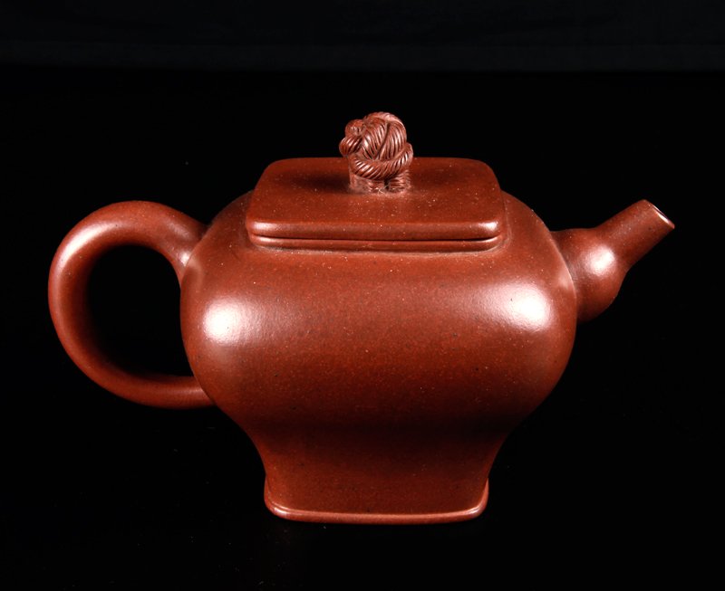 Chinese Yixing Clay Tea Pot: Larger top with narrow bottom, the lid with knot form handle. Four character mark on underside. 3.875" H x 6.25" L. Excellent condition.