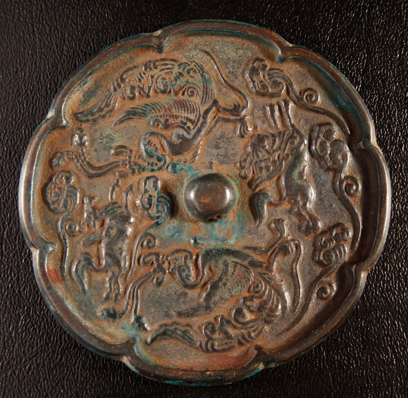 Chinese Bronze Hand Mirror: Floral shaped with Phoenix, chilong and ruyi designs. 3.75" DIA. Excellent condition.