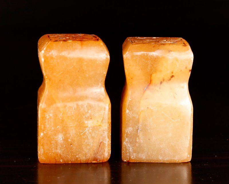 Pair of Chinese Hardstone Seals: Each with four character seal, the tops carved with bats and ruyi. 2" H x 1.25" Sq. Excellent condition.