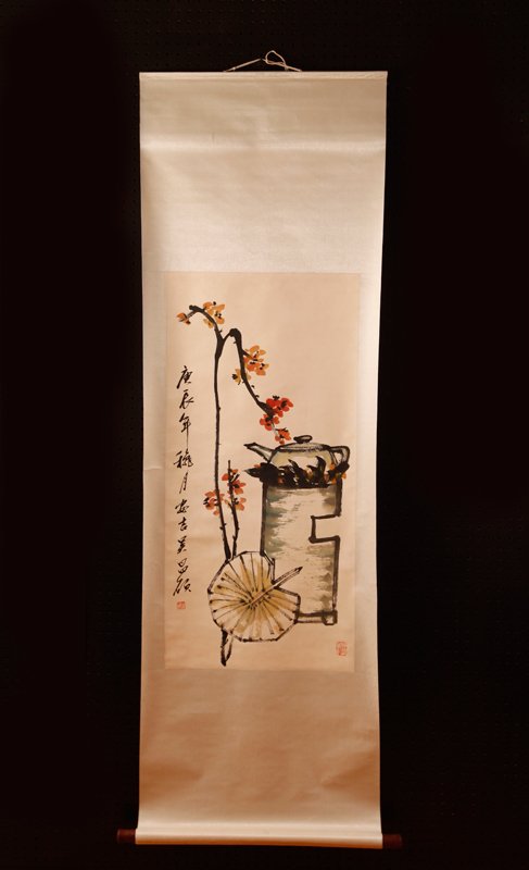Chinese Scroll Painting Attb. to Wu Chang Shuo: Attached to silk brocade, painted to depict a tea pot on a cart with leaf fan. Signature and seal mark along left side, with additional seal mark in lower right. 38.75" H x 18.5" W, painting only. Exc