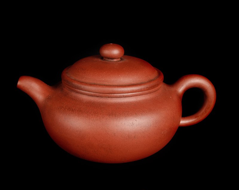 Chinese Yixing Clay Tea Pot: Plain tea pot with two seal marks to inside lid, and three character mark with two small marks to underside. 4.5" H x 8.5" L. Excellent condition.