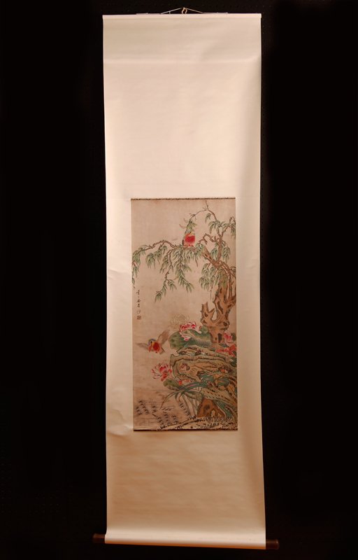 Chinese Scroll Painting Attb. To Yu Sheng: Attached to silk brocade, painted to depict tocan birds perched and flying with lotus, tree and body of water. Signature and two seal marks middle left. 34" H x 15.25" W, painting only. Excellent cond