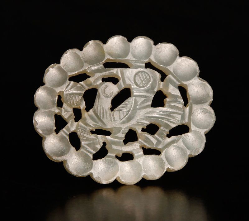 Chinese Qing Carved Jade Plaque: Oval plaque carved on one side with bird in center. 1.375" H x 1.625" W. Excellent condition.