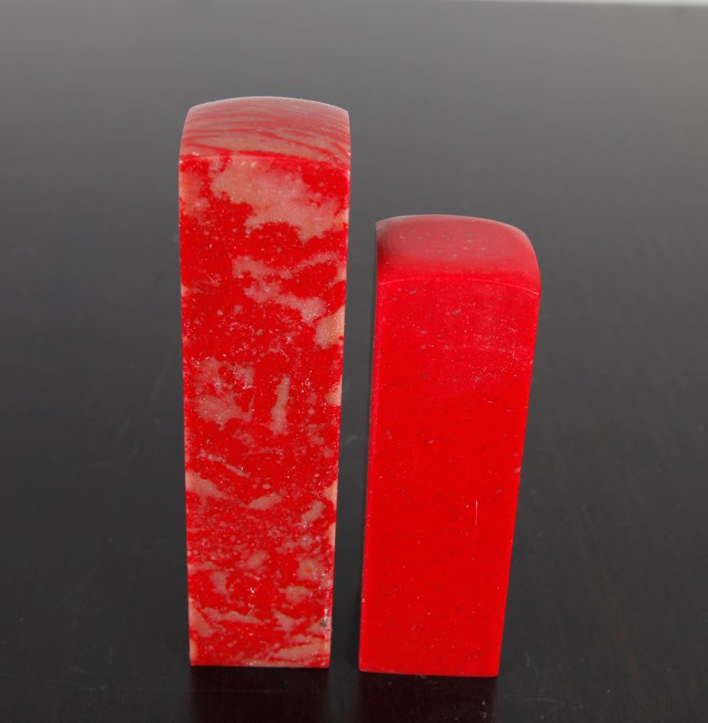2 Chinese Chicken Blood Soapstone Seals: Both blank, one darker red and one slightly larger. Largest measures 3.875" H x 1" Sq. Excellent condition.