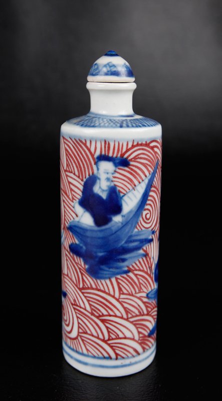 Chinese Blue & Red Porcelain Snuff Bottle: With four figures inside birds, animals and pods, surrounded by red swirll and clouds. Four character mark in blue. 4.125" H. Excellent condition.
