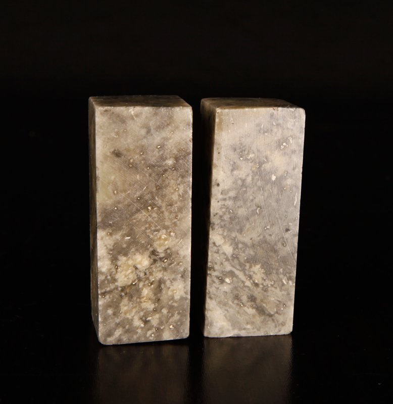 Pair of Chinese Soapstone Seals: Blank seals with slightly rounded tops in light and darker gray marble. 2" L. Excellent condition.