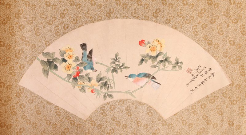Chinese Mounted Fan Face Painting: Attributed to Jiang Han Ting. Mounted on heavy paper, depicting floral branches with two blue birds. Signature and seal mark in red in upper left. Fan measures 7.25" H x 20.5" W. Excellent condition.