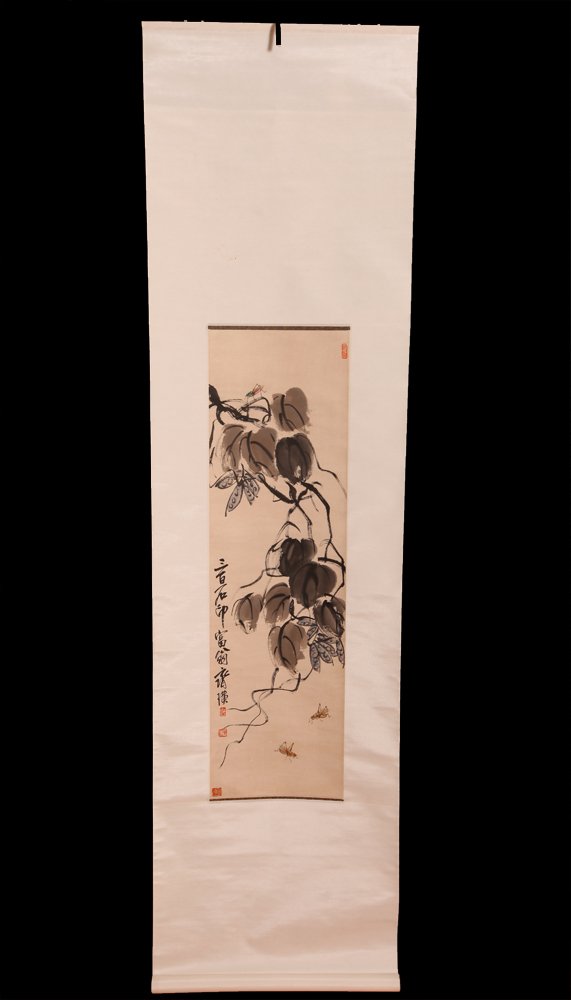 Chinese Watercolor Scroll Painting: Attached to silk brocade, painted to depict hanging fruit with grasshoppers. Caligraphy and three seal marks in red in middle to lower left. Painting measures 41" H x 11.75" W. Excellent condition.