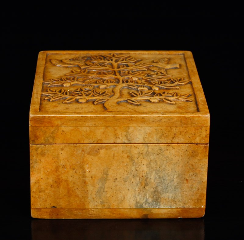 Chinese Republic Carved Soapstone Box: Lidded box, the top carved with birds in a peach tree, the box plain. 2.5" H x 5" L x 3.875" W. Excellent condition.