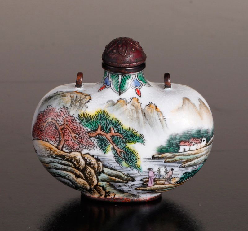 Chinese Enamel over Copper Snuff Bottle: Both sides painted in continuous mountain village scene with body of water, figures, figure in a boat and building. Four character mark in blue on underside. 2" H x 2.25" W. Excellent condition.
