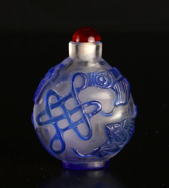 Chinese Peking Glass Snuff Bottle: Clear glass overlayed in cobalt depicting knots and bats. 2.5" H x 1.875" W. Excellent condition.