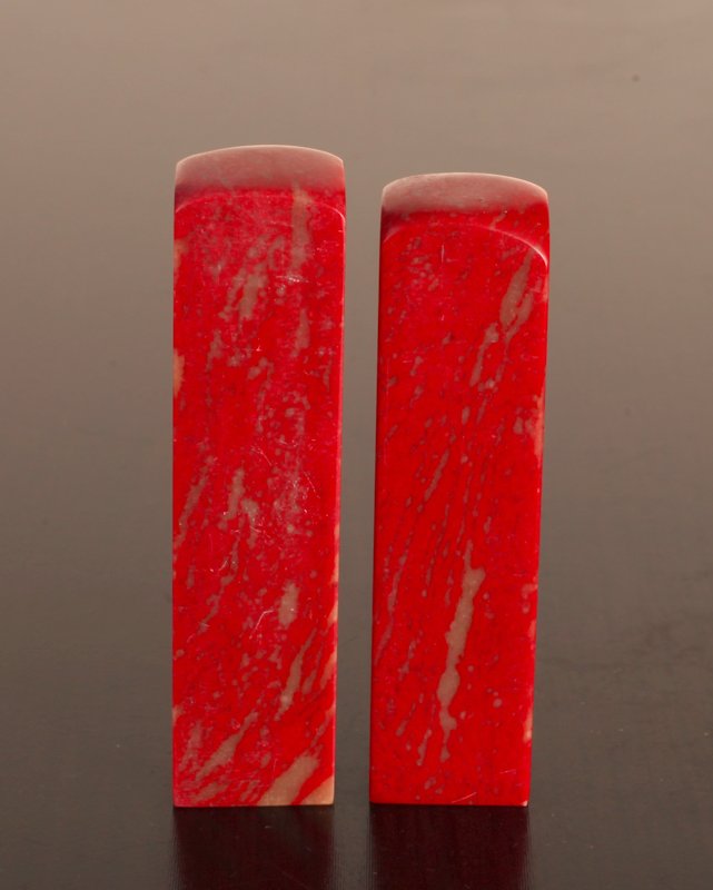 Pair of Chinese Soapstone Seals: Both blank, in red and light gray. One slightly larger, largest measures 3" H x .75" Sq. Excellent condition.