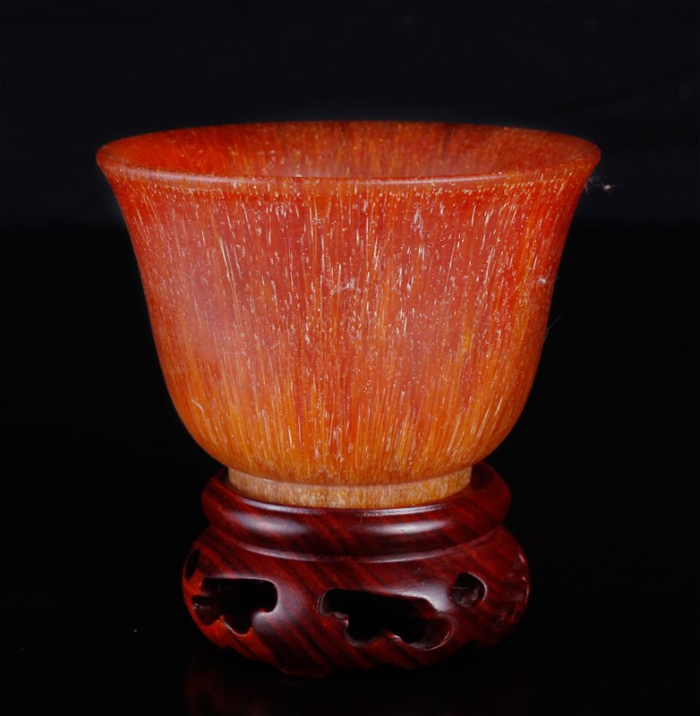 Chinese Horn Style Cup on Stand: Footed cup on carved wood stand. Cup measures 2.25" H x 3.25" Dia. Excellent condition.